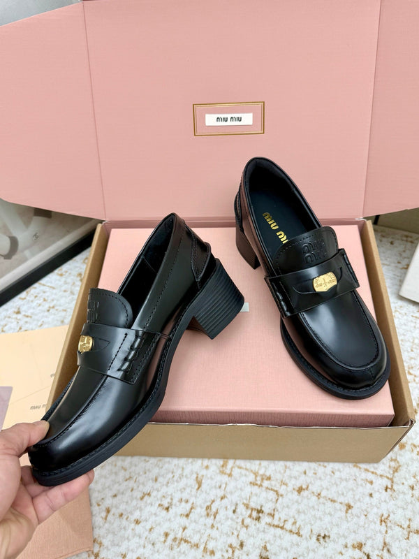 Miu Vintage-Effect Penny Loafers Black Leather 791004