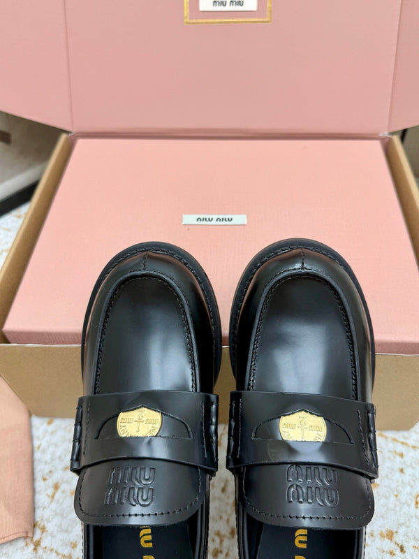 Miu Vintage-Effect Penny Loafers Black Leather 791004