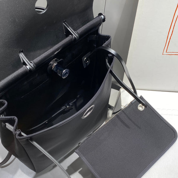 HERBAG A DOS ZIP RETOURNE BACKPACK 29 IN BLACK CANVAS AND CALFSKIN