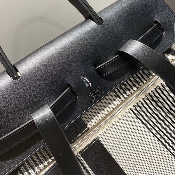 HERBAG A DOS ZIP RETOURNE BACKPACK 29 IN OFF-WHITE MIX BLACK CANVAS AND CALFSKIN