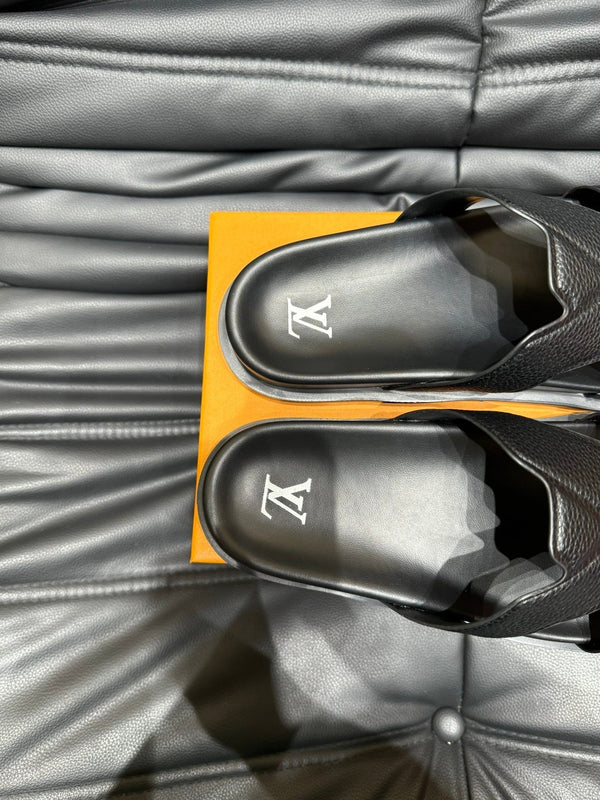 LV OASIS MULE IN BLACK CALFSKIN