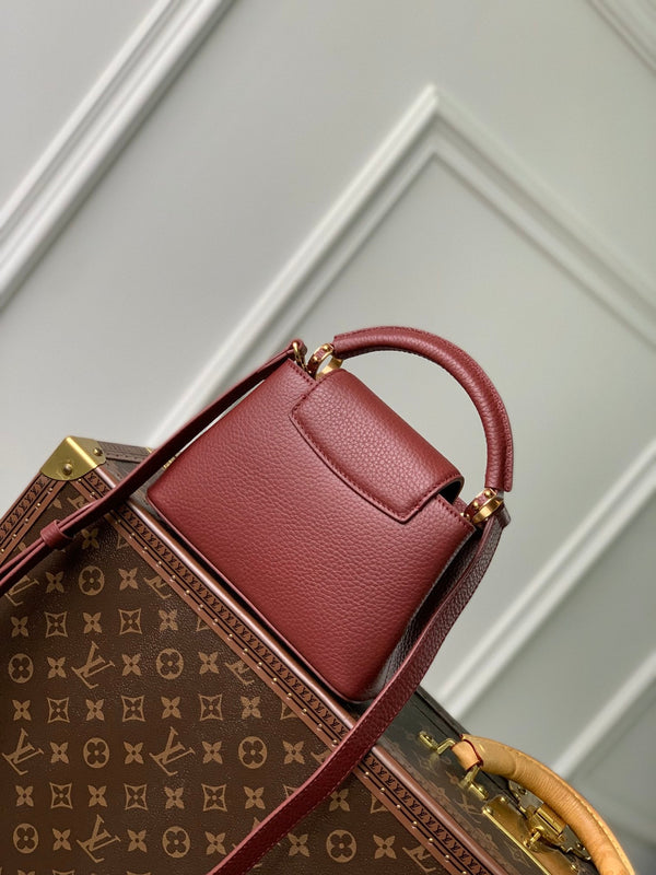 CAPUCINES MINI 21 BURGUNDY TAURILLON GOLD HARDWARE