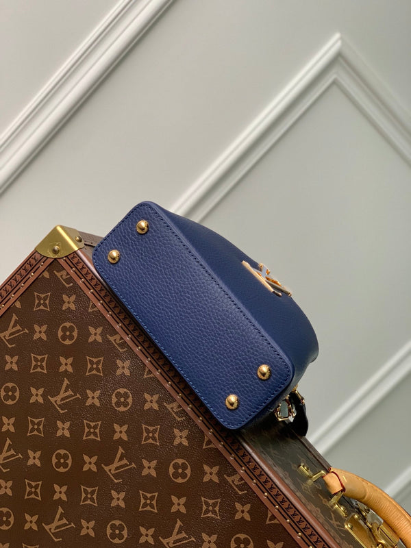 CAPUCINES MINI 21 DARK BLUE TAURILLON GOLD HARDWARE