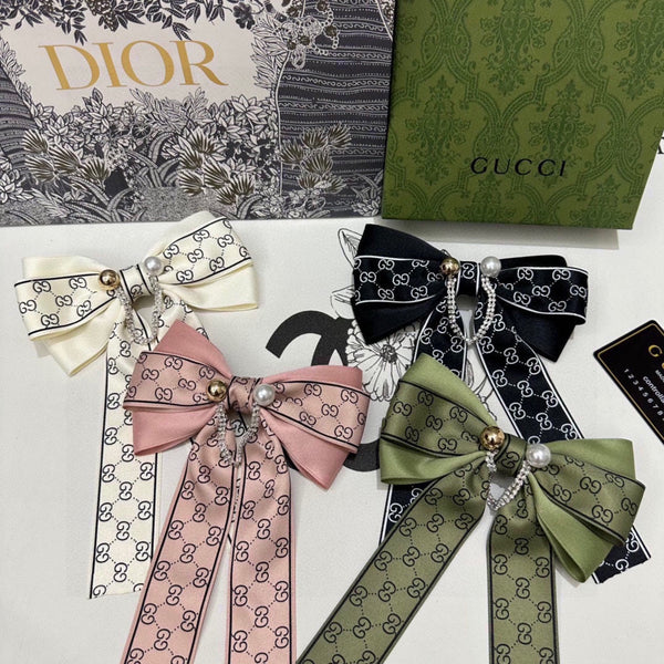 PINCE À CHEVEUX AVEC NŒUD EN RE-NYLON NOIR ET PERLE 358260