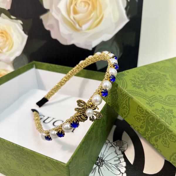 HAIRBAND EMBELLISHED DIAMOND AND PEARL IN GOLD METAL 376822