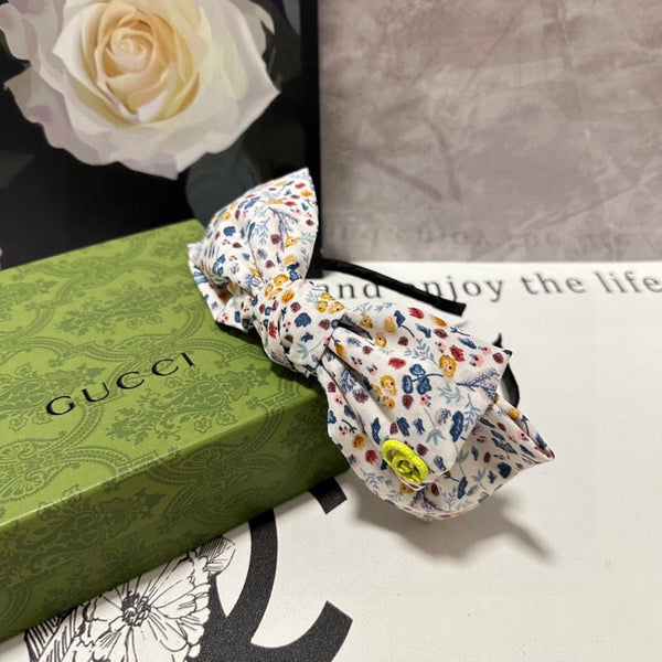 HAIRBAND IN WHITE FLORAL FABRIC 385855