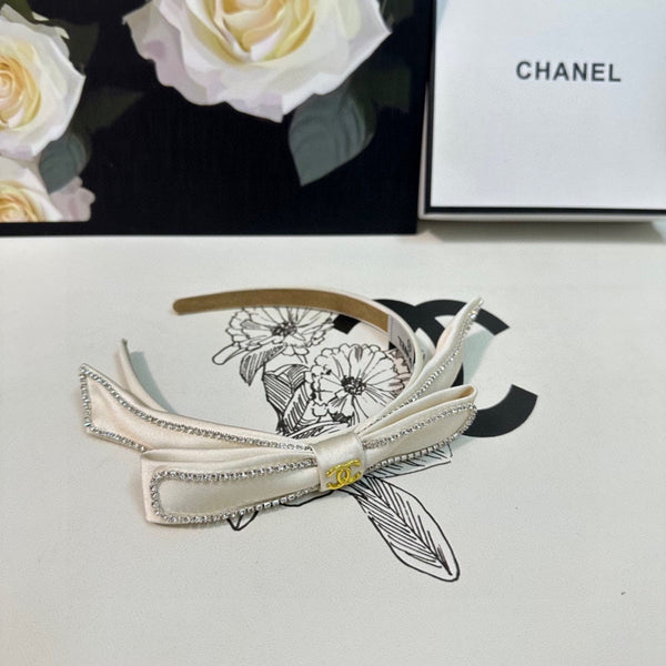 CERCHIETTO IN TESSUTO BIANCO CON CRISTALLI 412464