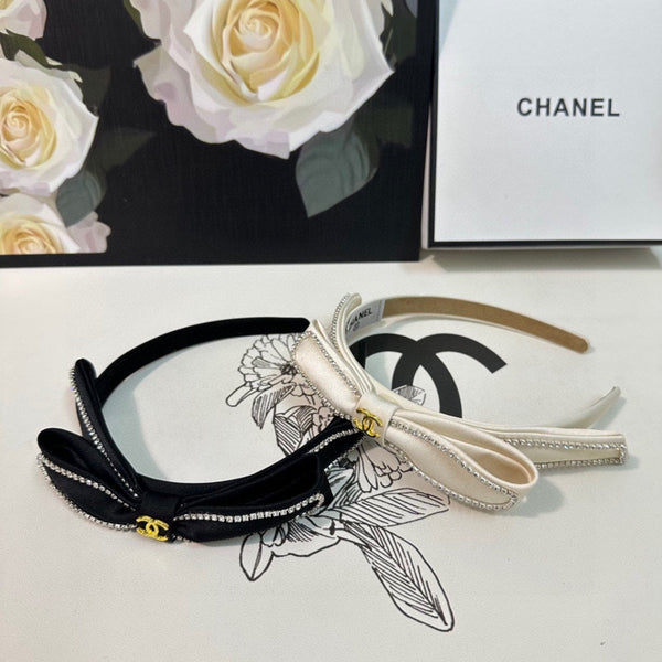 CERCHIETTO IN TESSUTO BIANCO CON CRISTALLI 412464