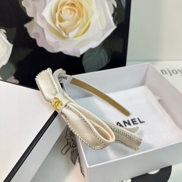 CERCHIETTO IN TESSUTO BIANCO CON CRISTALLI 412464