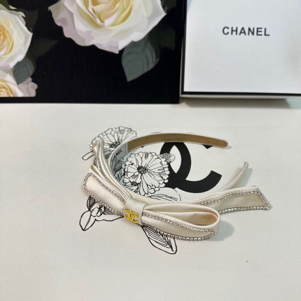 CERCHIETTO IN TESSUTO BIANCO CON CRISTALLI 412464