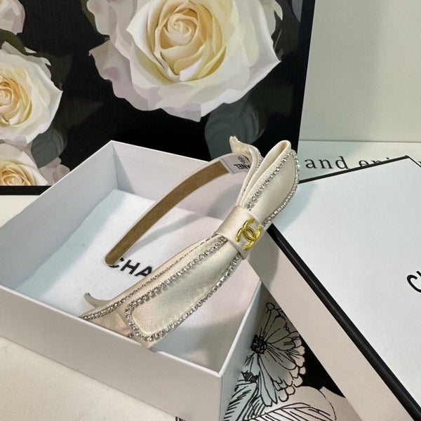 CERCHIETTO IN TESSUTO BIANCO CON CRISTALLI 412464