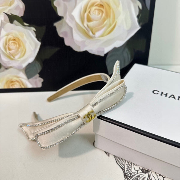 CERCHIETTO IN TESSUTO BIANCO CON CRISTALLI 412464
