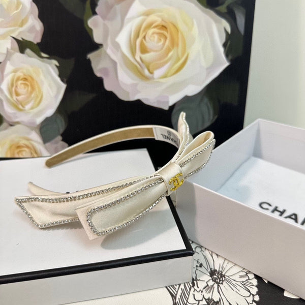 CERCHIETTO IN TESSUTO BIANCO CON CRISTALLI 412464