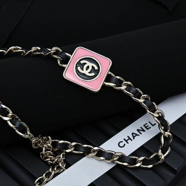 CHAIN CHOKER IN GOLD-PLATED METAL WITH LEATHER THROUGH LINKS