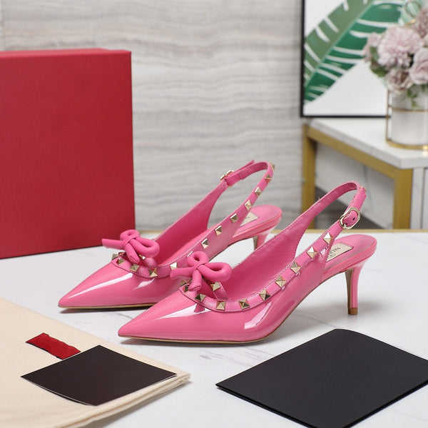 Rockstud Bow Slingback in pelle di vitello rosa con borchie abbinate