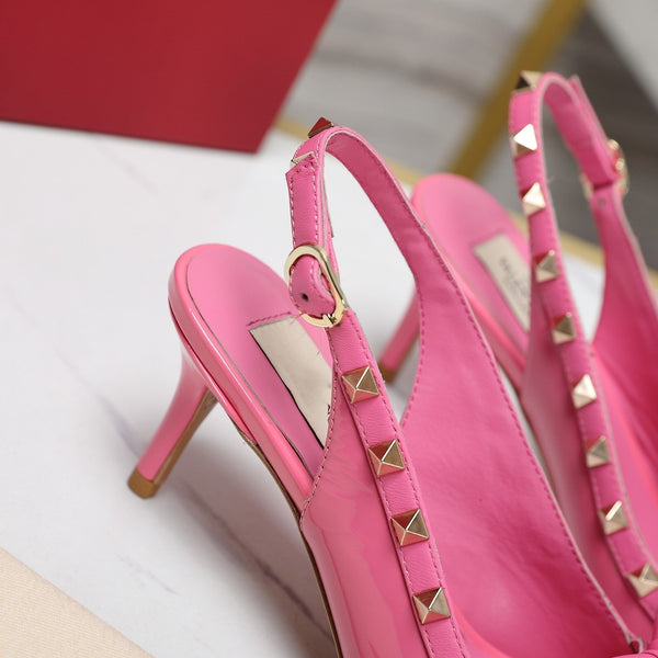 Rockstud Bow Slingback in pelle di vitello rosa con borchie abbinate