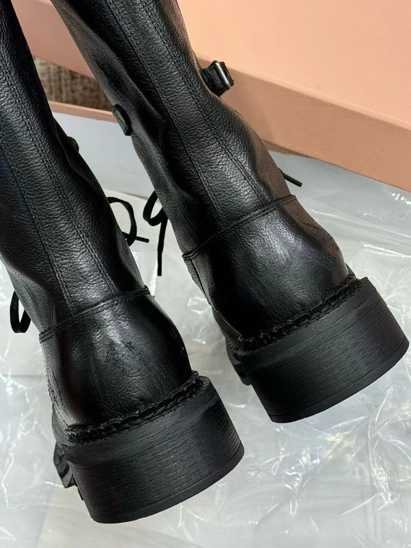 Bottes Miu à talon haut en veau verni noir