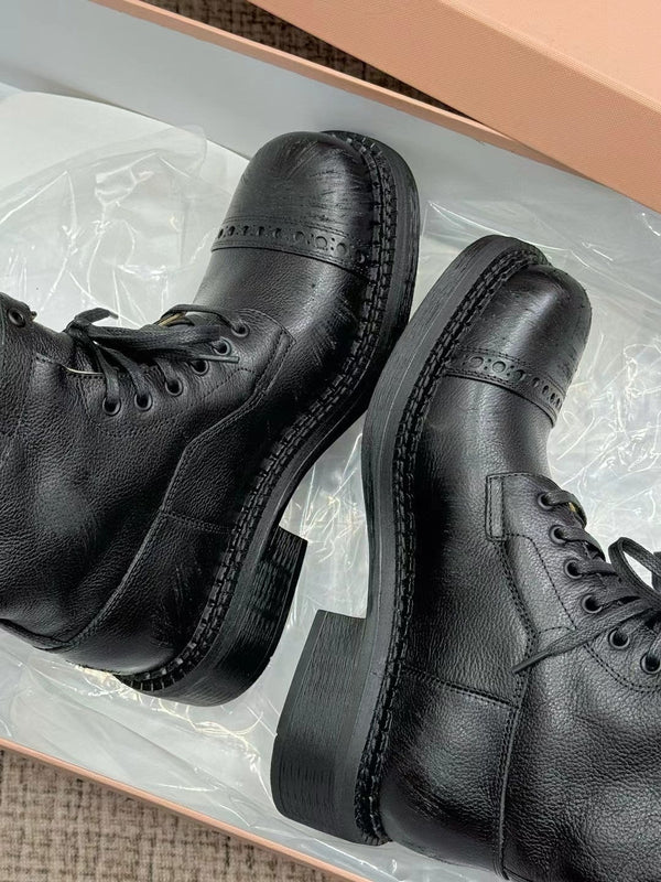 Bottes Miu à talon haut en veau verni noir