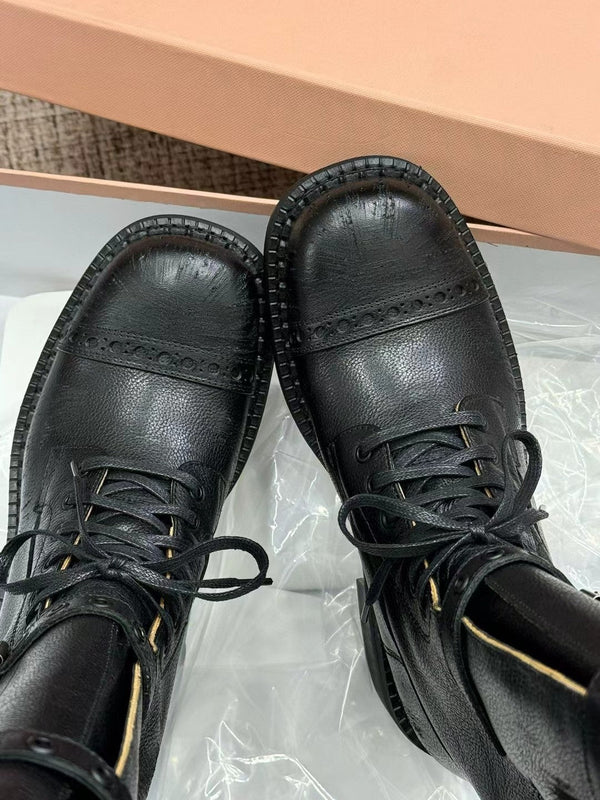 Bottes Miu à talon haut en veau verni noir