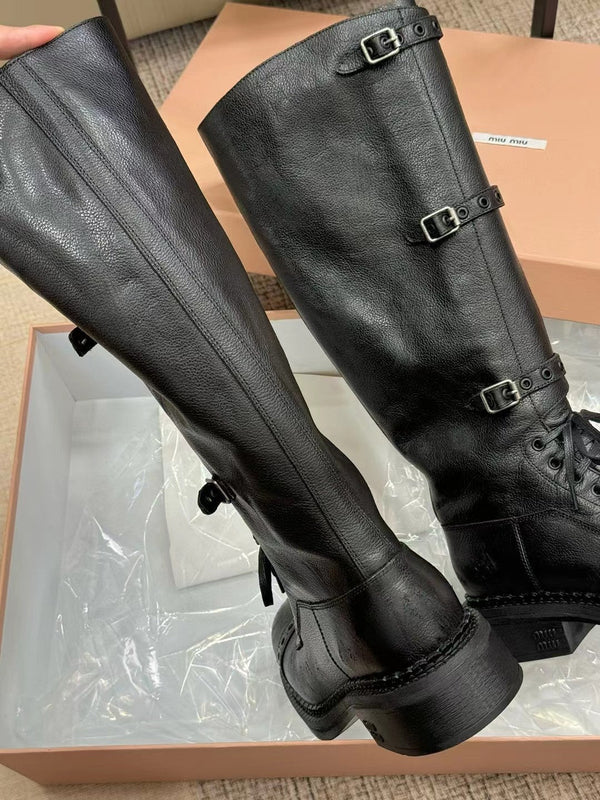Bottes Miu à talon haut en veau verni noir