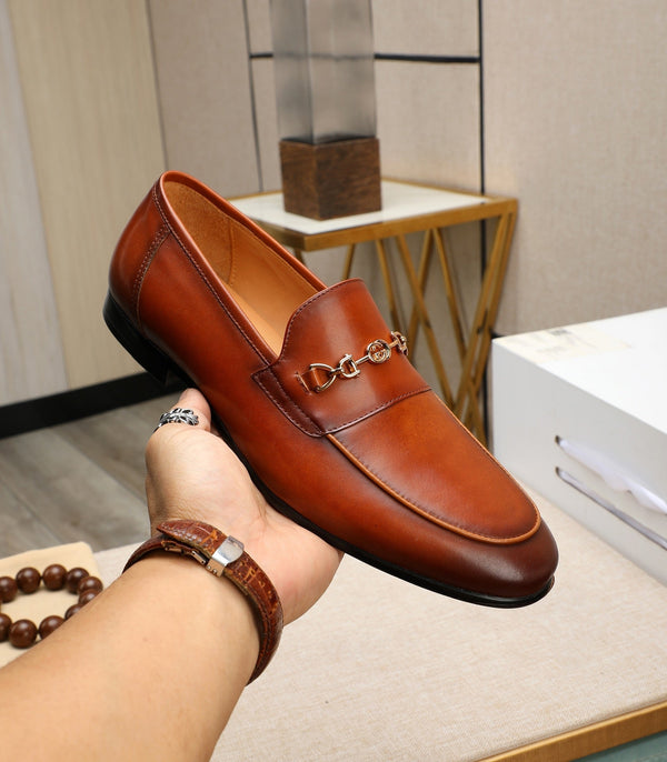 Mocassino da uomo GG in pelle di vacchetta marrone 526010