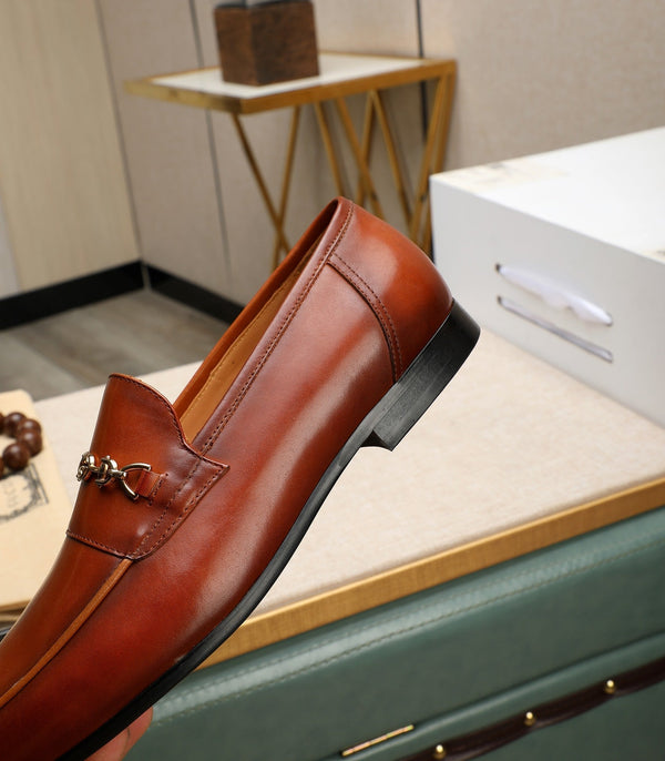 Mocassino da uomo GG in pelle di vacchetta marrone 526010