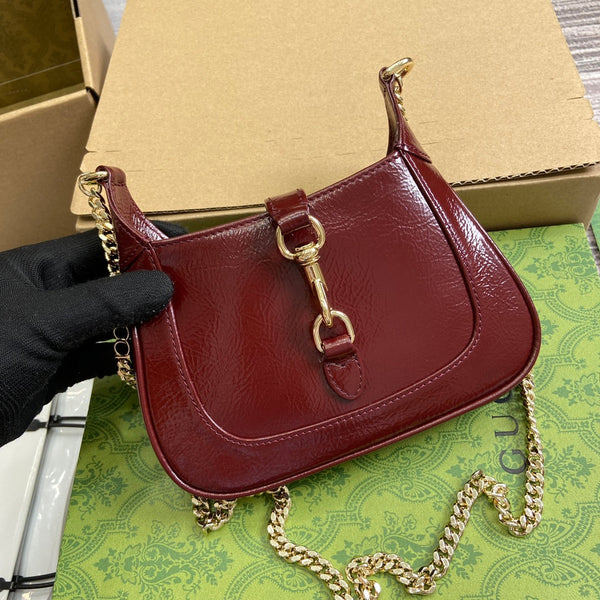 BORSA MINI JACKIE NOTTE 19 IN PELLE DI VITELLO LACCATA SCREPOLATA COLOR VINO ROSSO E FERRAMENTA ORO