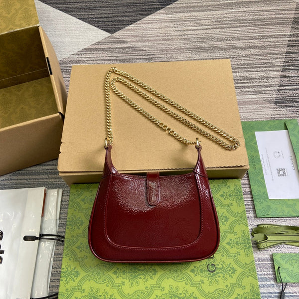BORSA MINI JACKIE NOTTE 19 IN PELLE DI VITELLO LACCATA SCREPOLATA COLOR VINO ROSSO E FERRAMENTA ORO