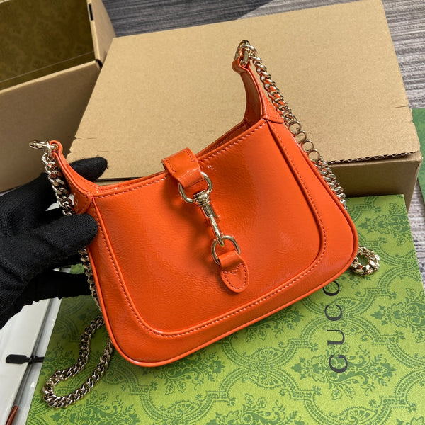 JACKIE NOTTE MINI BAG 19 IN ORANGE CRACKED LACQUER CALFSKIN GOLD HARDWARE