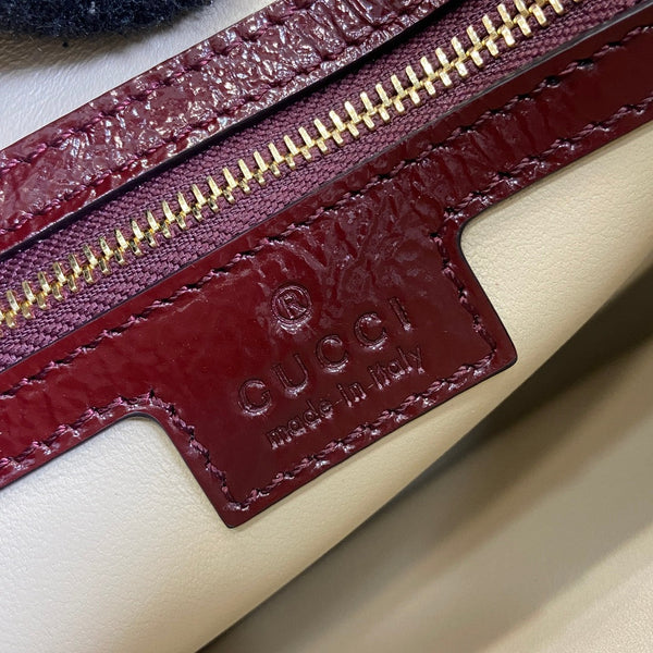 BORSA A TRACOLLA JACKIE PICCOLA 27 IN PELLE DI VITELLO LACCATA SCREPOLATA ROSSO VINO CON FERRAMENTA ORO