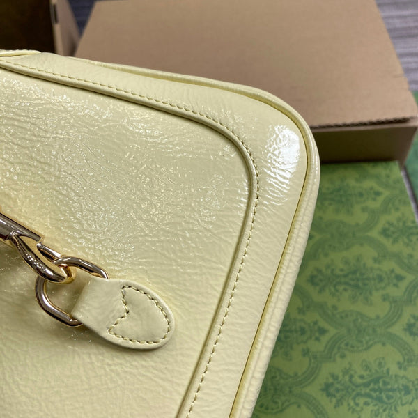 BORSA MINI JACKIE NOTTE 19 IN PELLE DI VITELLO LACCATA SCREPOLATA GIALLO CHIARO E FERRAMENTA ORO