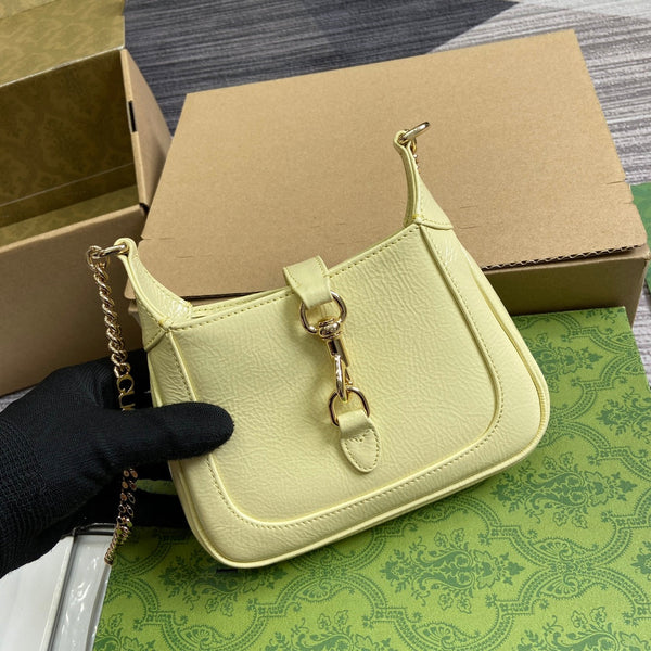 BORSA MINI JACKIE NOTTE 19 IN PELLE DI VITELLO LACCATA SCREPOLATA GIALLO CHIARO E FERRAMENTA ORO