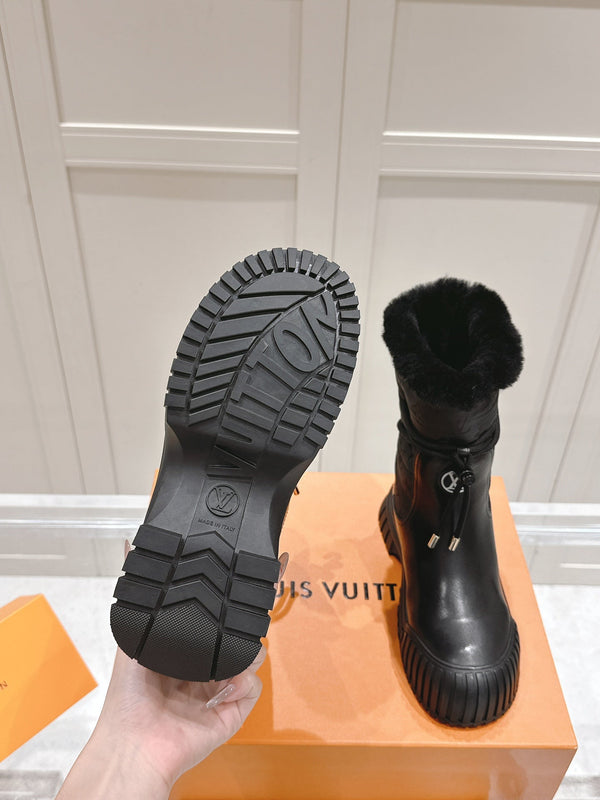 RUBY FLAT ANKLE BOOT IN BLACK CALFSKIN AND MONOGRAM NYLON