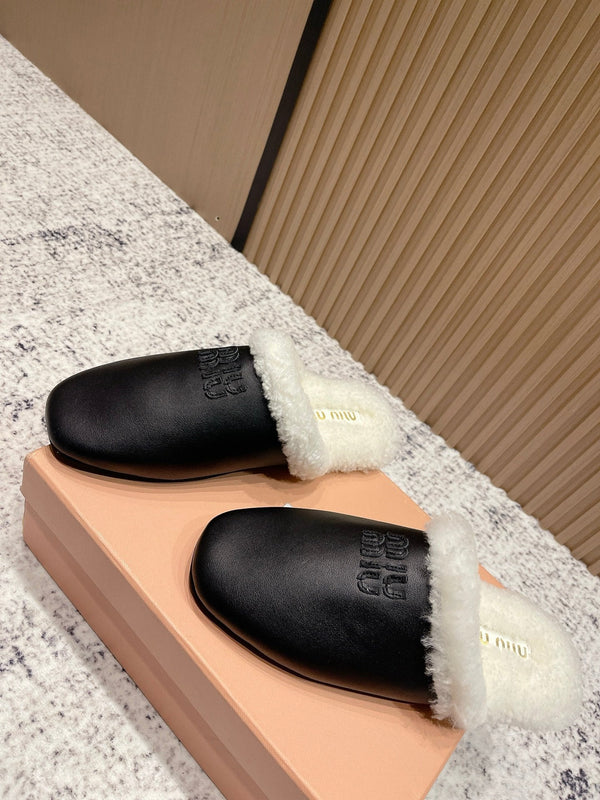 Miu Shearling-Lined Mules Black Cowhide 481432