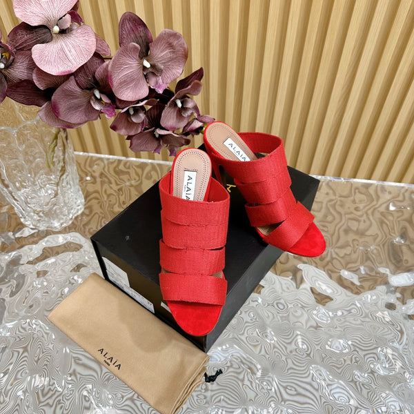 SANDALI ALAIA ELASTIC CAGE MULE CON CINTURINO INTRECCIATO ROSSO CILIEGIA E PELLE DI AGNELLO