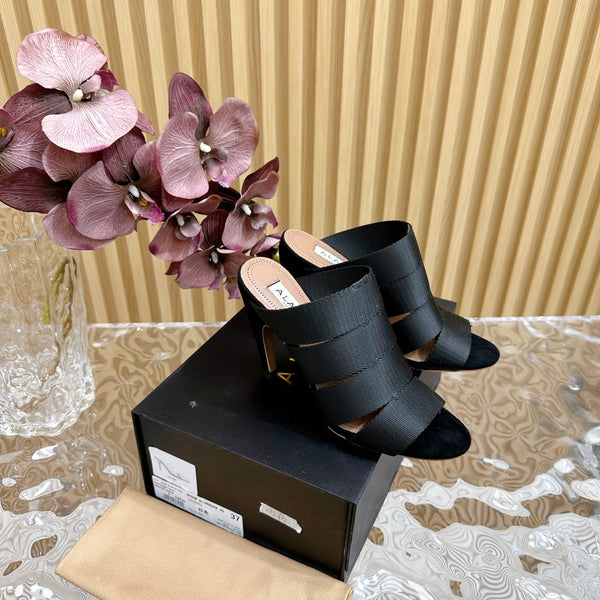 ALAIA ELASTIC CAGE MULE SANDALS IN BLACK WOVEN STRAP AND LAMBSKIN