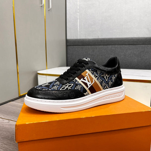 LV TRAINER IN BLACK EMBOSSED CALFSKIN AND MONOGRAM FABRIC