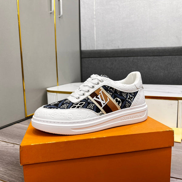 LV TRAINER IN WHITE EMBOSSED CALFSKIN AND MONOGRAM FABRIC