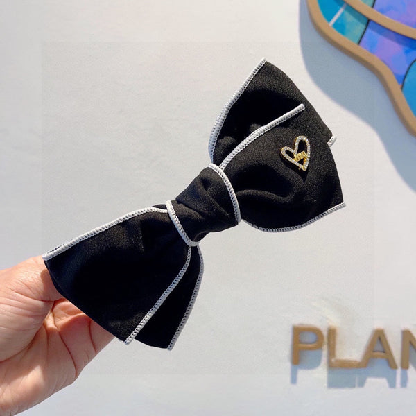 BOW HAIRPIN IN BLACK AND WHITE TRIM COTTON 406022