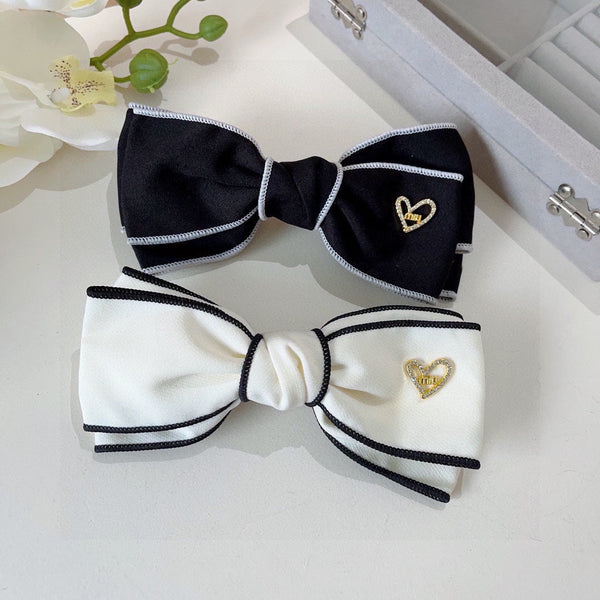 BOW HAIRPIN IN WHITE AND BLACK TRIM COTTON 406023