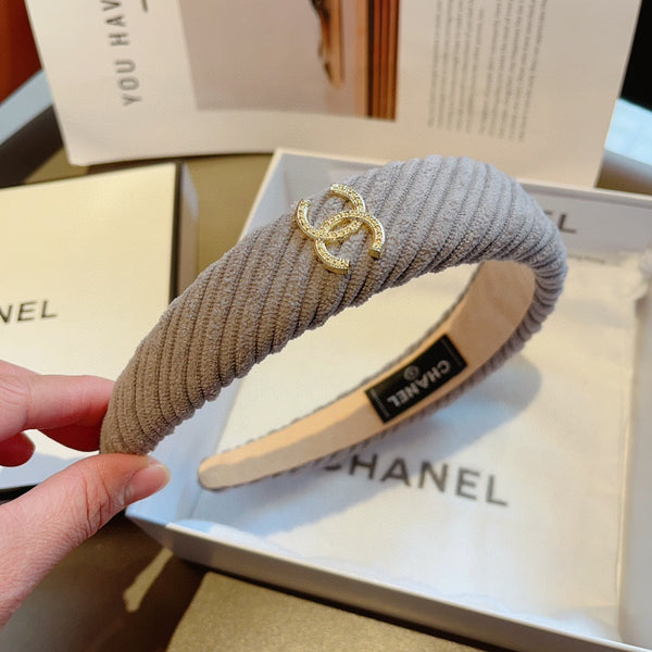 SERRE-TÊTE EN TISSU MARRON KAKI AVEC LOGO DORÉ 414435
