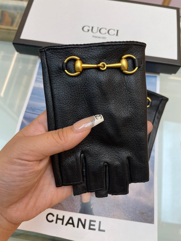 FINGERLESS GLOVES IN BLACK LAMBSKIN WITH GOLD HORSEBIT 432606