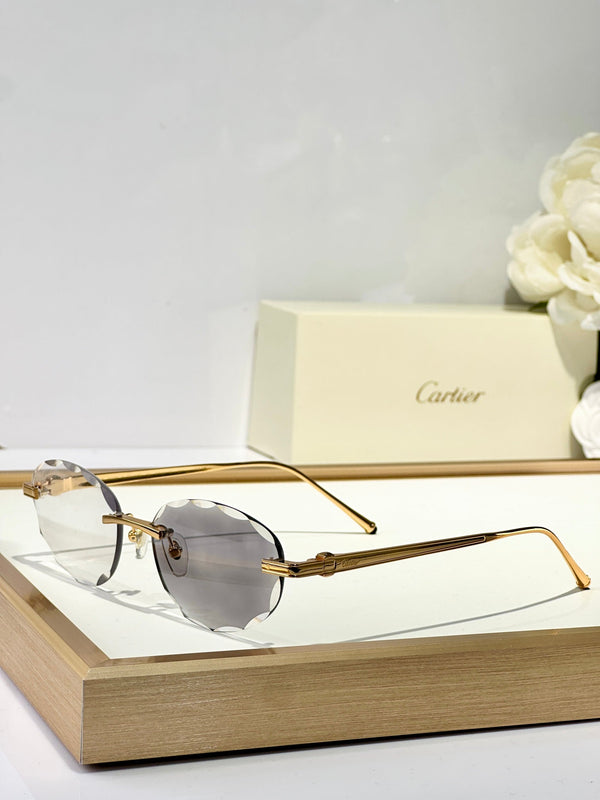 C DE RIMLESS ROUND FRAME SUNGLASSES CT0611S IN METAL