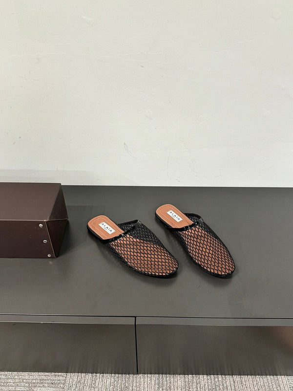 MULES ALAIA FLAT IN RETE NERA