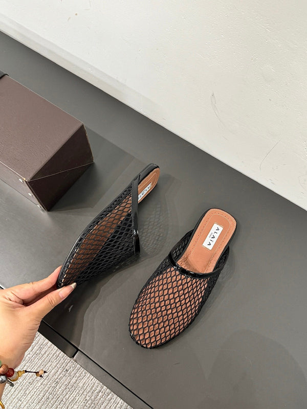 MULES ALAIA FLAT IN RETE NERA