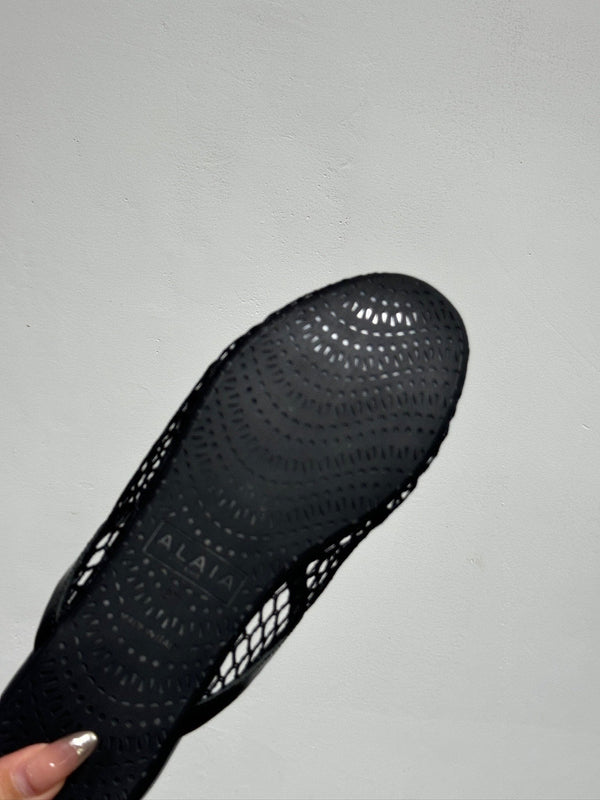 MULES ALAIA FLAT IN RETE NERA