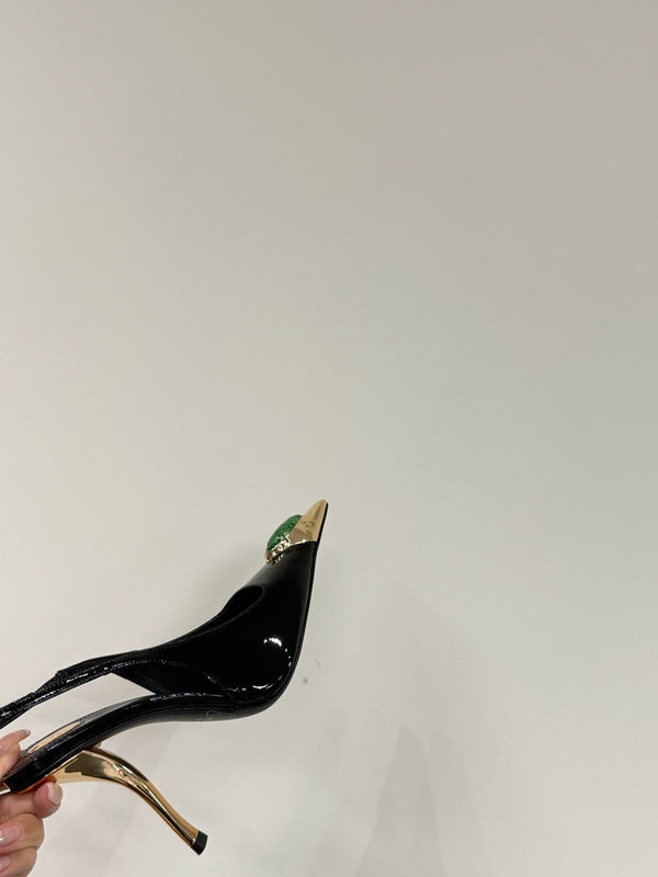 GREEN GEM-STUDDED SLINGBACK PUMPS IN BLACK PATENT CALFSKIN