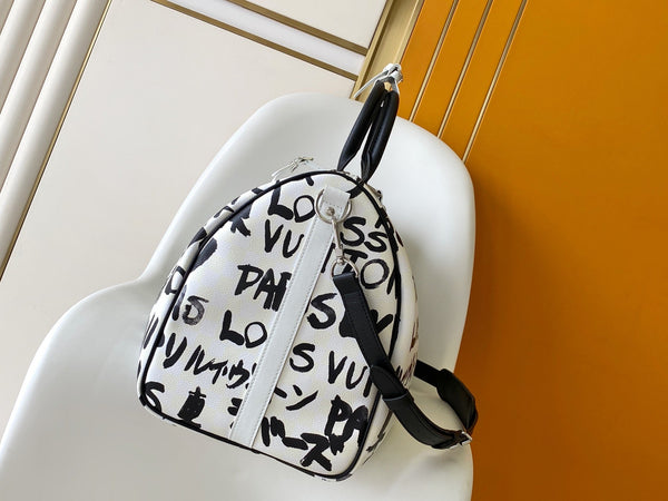 LVx N&PW Keepall Bandoulière 50 Black White Cowhide