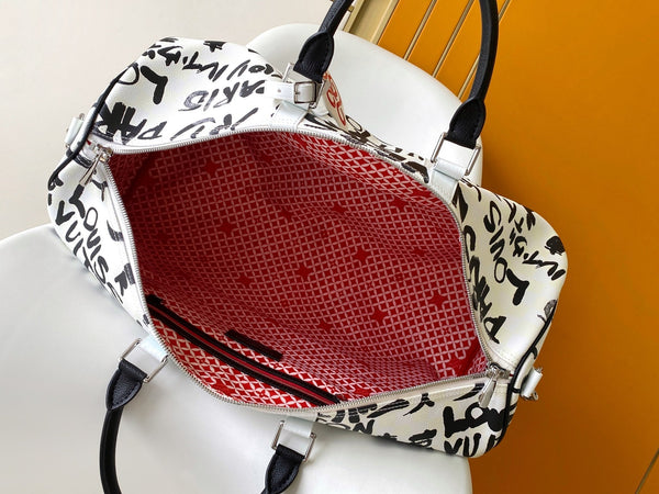 LVx N&PW Keepall Bandoulière 50 Black White Cowhide