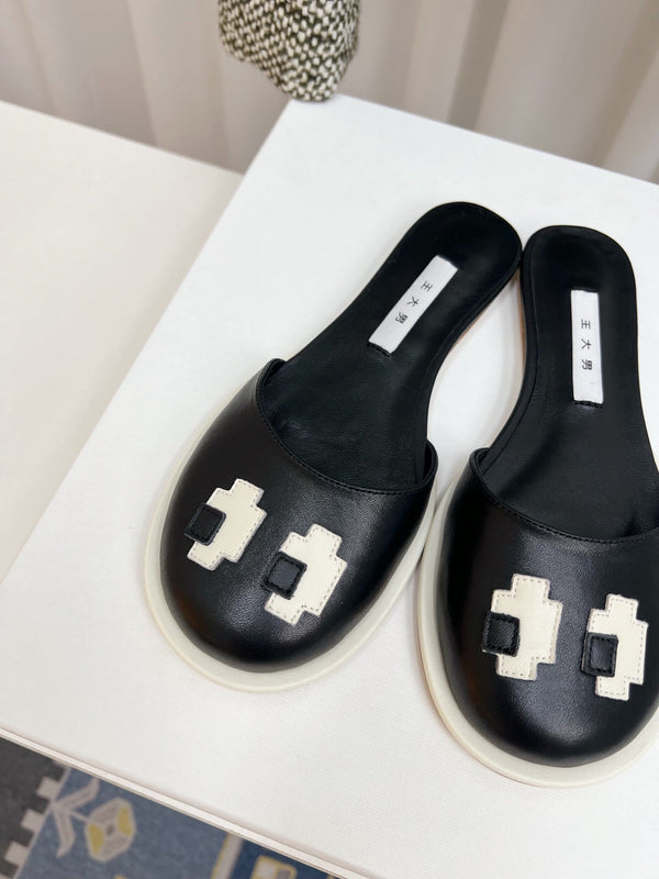 The Row Semi Slippers Black Sheepskin 827492